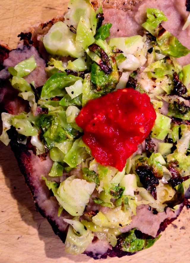 grilled bread with sprouts and tomato sauce