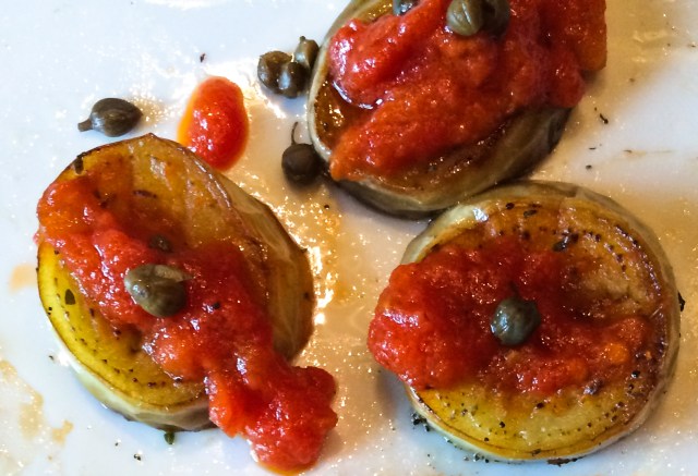 eggplant tomato capers closeup