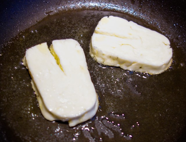 Halloumi frying on side one